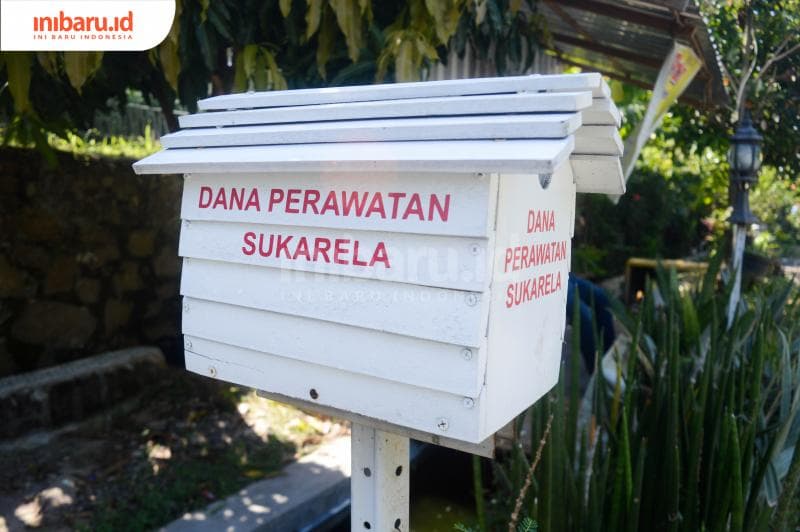 Kotak pos yang sengaja dipasang warga untuk sarana donasi sebagai langkah support kolam ikan.&nbsp;(Inibaru.id/Kharisma Ghana Tawakal)